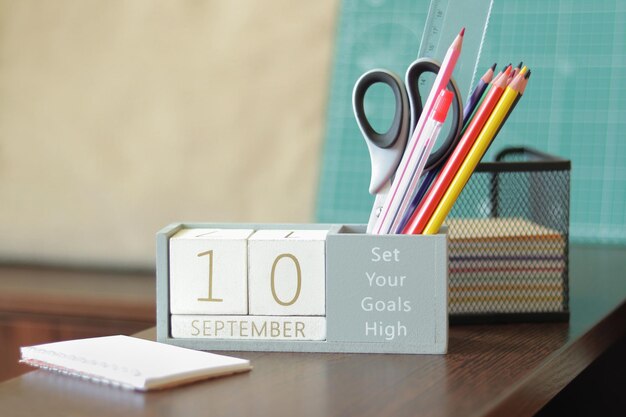 10 September Image of september 10 wooden calendar on desktop Autumn day Back to school