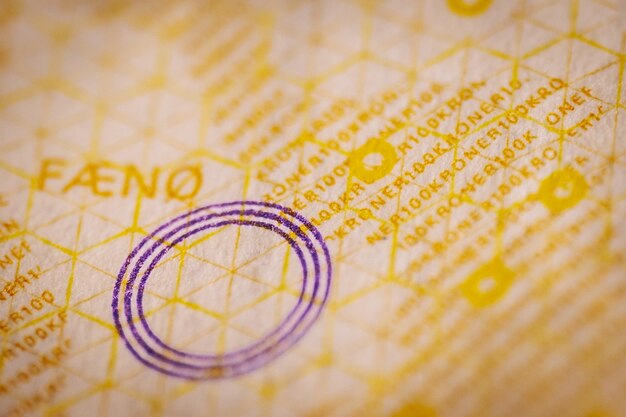 Photo 100 danish krone banknotefront and back banknote on the flag of denmark of the background texture top view