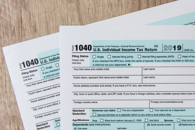 1040 tax form close up on desk. tax time. taxes concept