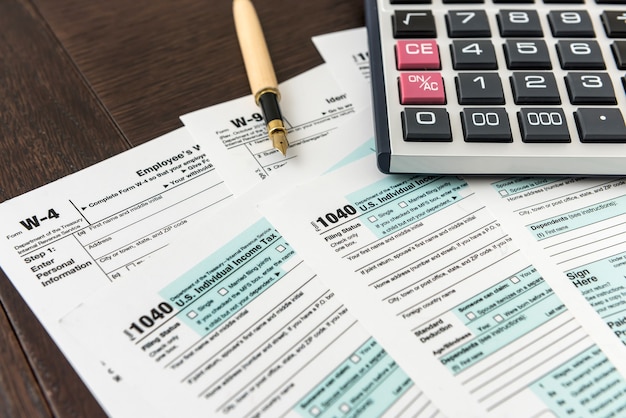 1040 tax form with pen, finance document.Paperwork