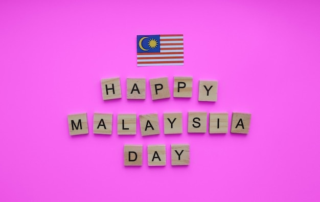 16 september gelukkige Malaysia Day-vlag van de minimalistische banner van Maleisië met de inscriptie in houten letters