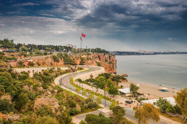 19 May 2022 Antalya Turkey scenic panoramic view with winding road decorated for holiday with numerous flags Travel destinations of Turkey and Antalya and mediterranean riviera