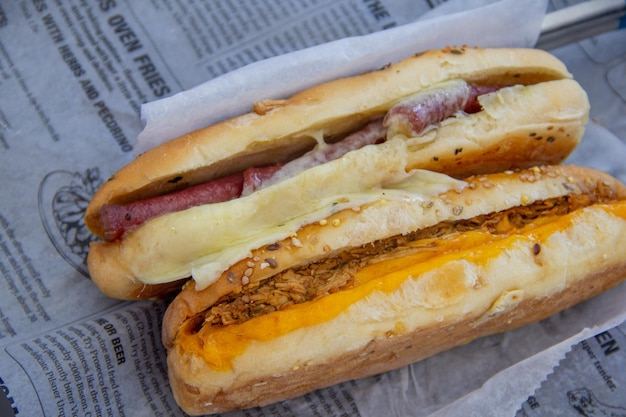 2 Cuban sandwich with cheese ham and fried pork served in vegetable paper