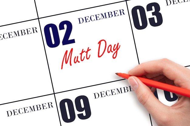 2 december Handgeschreven tekst Mutt Day op kalenderdatum Bewaar de datum