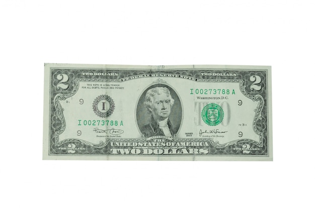 Photo 2 dollars bill isolated on white