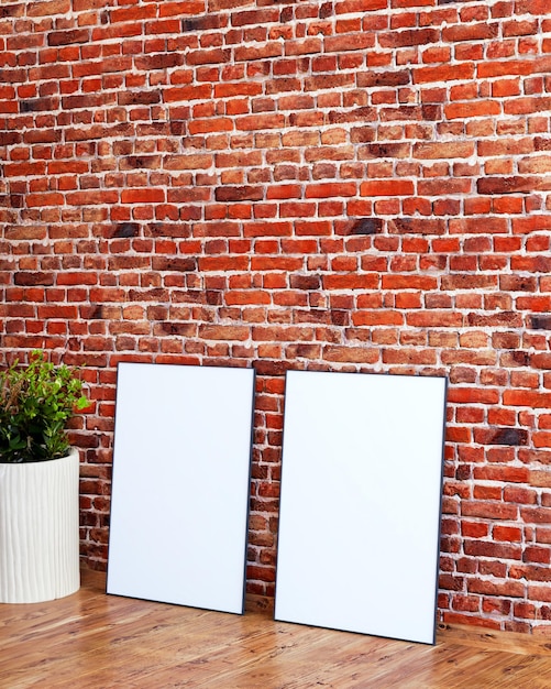 2 frame mockup on red brick wall with an indoor plant and wooden floor interior 3d render