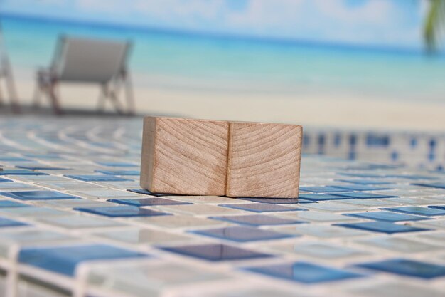 Photo 2 wood blocks mosaic swimming pool ocean beach freelance business concept