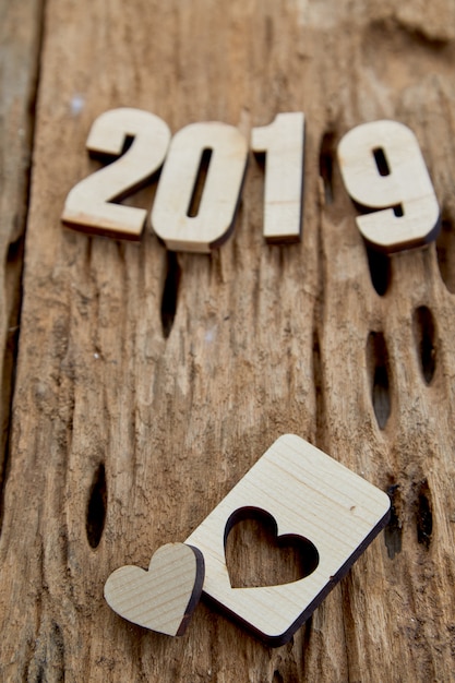 2019 wood heart on wooden