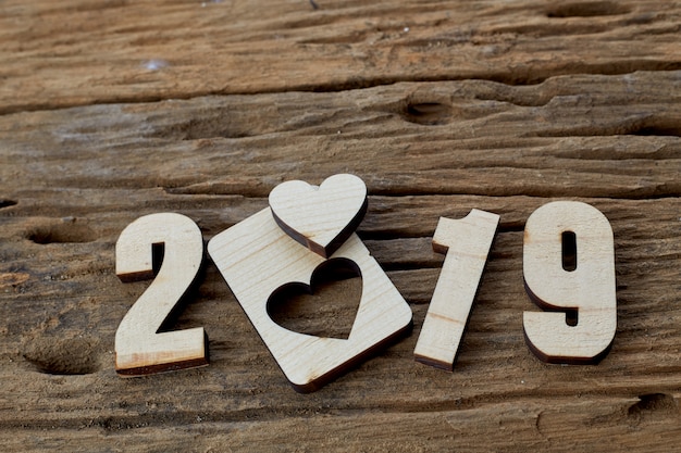 2019 wood heart on wooden