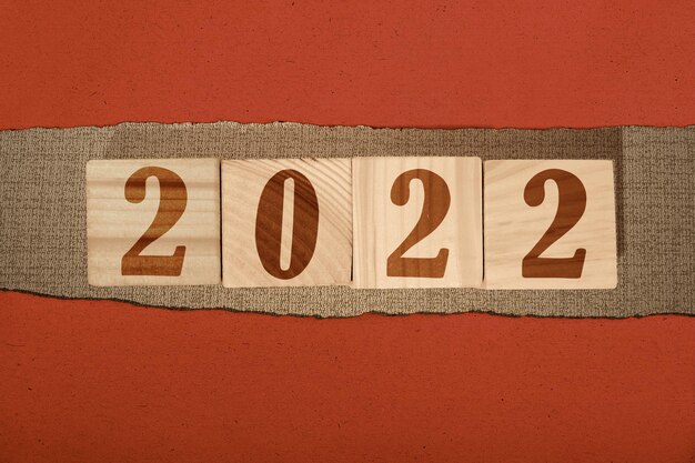 Photo 2022 on the wooden cube. happy new year 2022