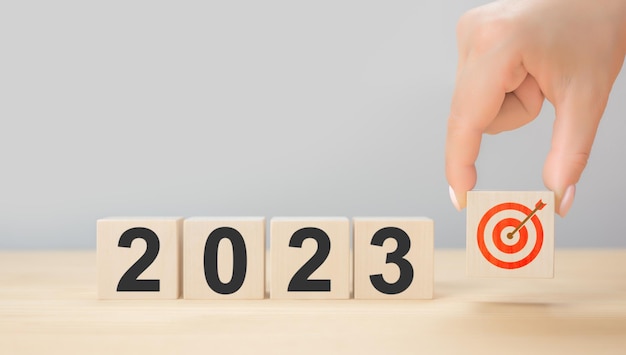 2023 new year planning and challenge business strategy\
opportunity hope new life change new year goals 2023 on cubes goals\
plan strategy business idea action concept