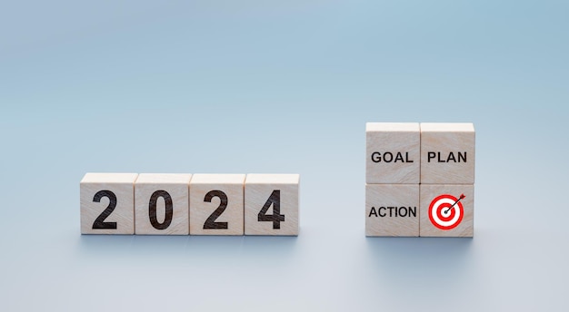 2024 Goal plan action Business common goals for planning new project annual plan business target achievement Wooden cubes with 2024