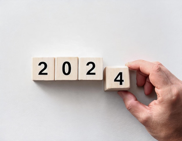 2024 Happy New Year eve wooden blocks flip change hand countdown starting ending 2023 action sched