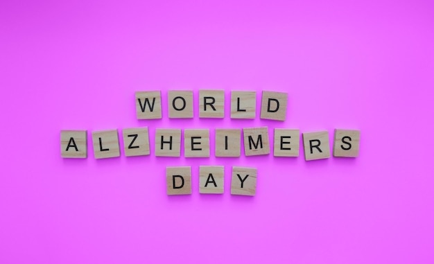 21 september Wereld Alzheimerdag minimalistische banner met de inscriptie in houten letters