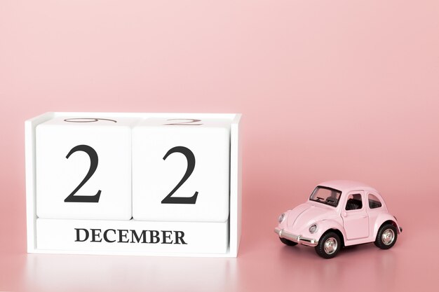 22 december. Dag 22 van de maand. Kalenderkubus met auto