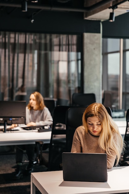 23112018 Kyiv Ukraine photo of young people working at a computer in a modern coworking office