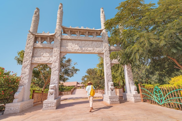 24 February 2021 Dubai UAE a visitor enters the gate of an Asian village decorated with oriental patterns