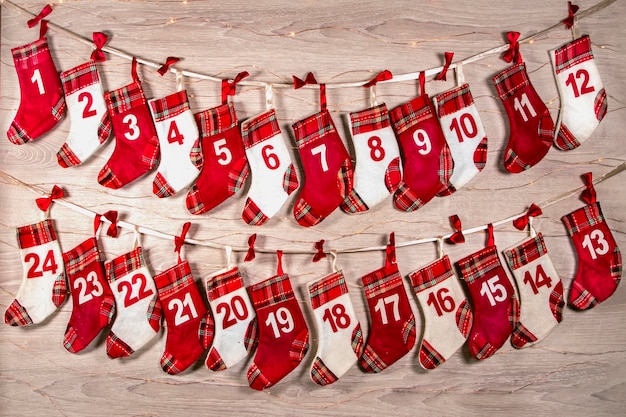 24 socks of advent calendar hanging on the wall fore small gifts surprises for children