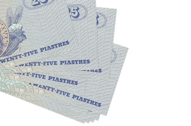 25 Egyptian piastres bills lies in small bunch or pack isolated on white