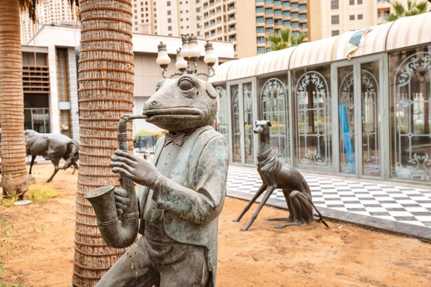 25 February 2021 Dubai UAE A statue of a frog in a suit playing jazz on a saxophone in the JBR area of Dubai