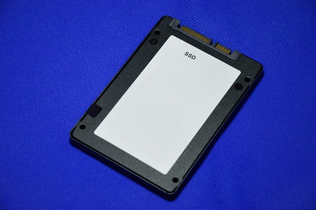 Photo 25 inch ssd hard drive laid on a blue background