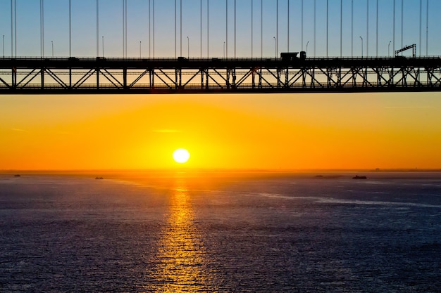 25th of april bridge at sunrise, lisbon, portugal