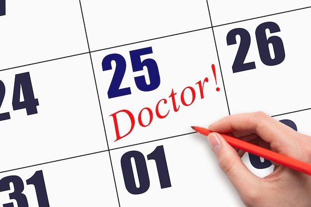 25th day of the month Hand writing text DOCTOR on calendar date