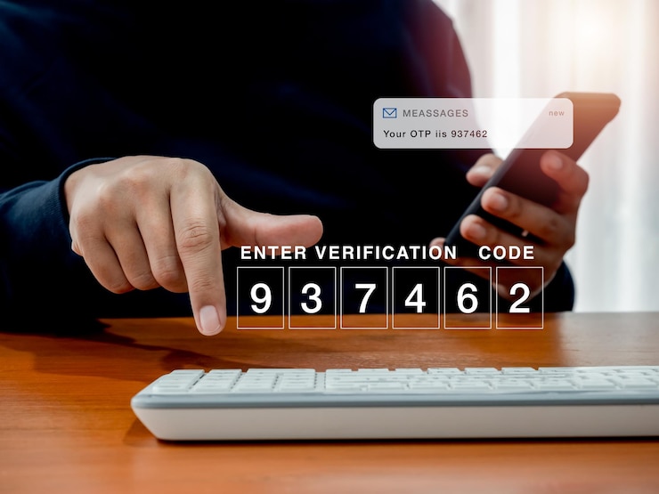 2FA or two factor authentication cyber security concept Password code number for enter verification code showing on computer while man hold smartphone and got sms with otp passcode for security