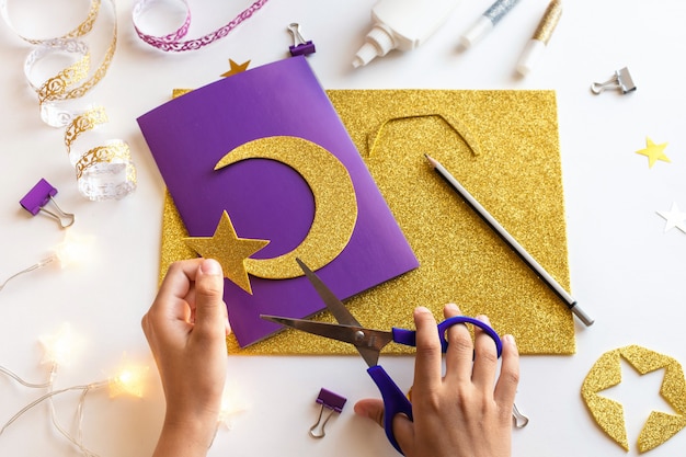 3 Diy Ramadan kareem card with golden crescent moon and a star.