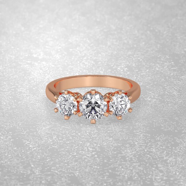 3 stone engagement ring laying down position in rose gold 3D render