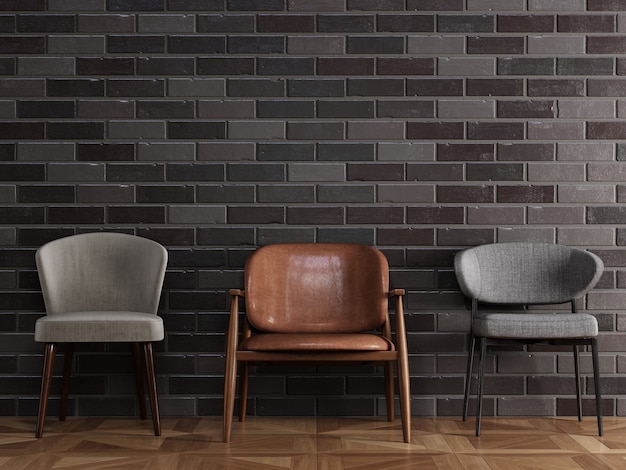 3 verschillende stoelen in moderne stijl die zich voor zwarte bakstenen muur bevinden met copyspace