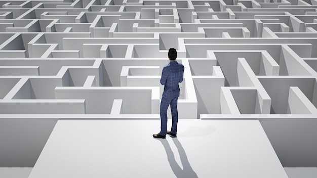 3d businessman standing in front of the maze. success concept.