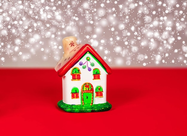 Premium AI Image | 3d christmas fairy house on red background