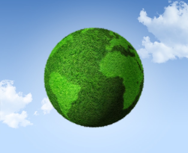 3D green grass globe on a blue sky