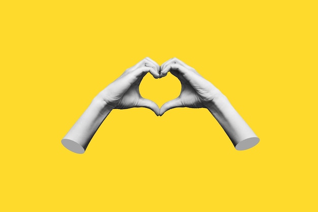 노란색 배경에 고립 된 심장 모양을 보여주는 3d 인간의 여성 손