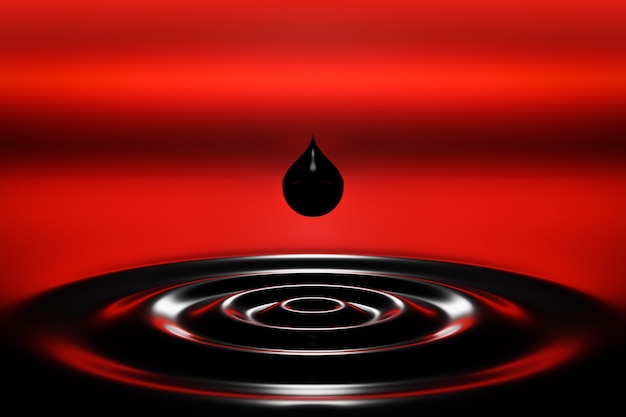 3D illustration black petroleum drop of oil falls