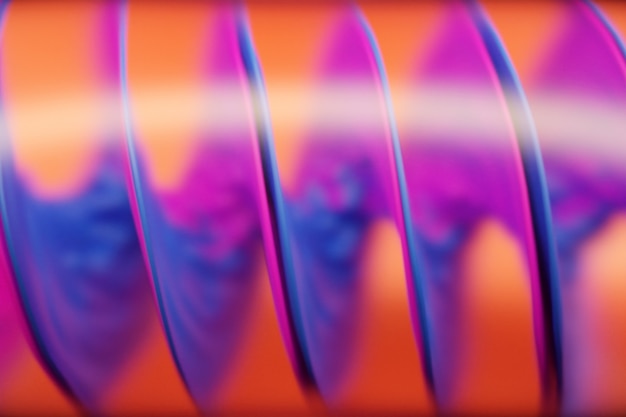 3D illustration of a hypnotic pattern.3d illustration of a horizontal spiral made of pink blue liquid.