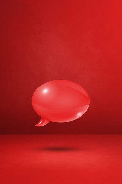 3D red speech bubble isolated on concrete wall vertical background