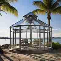 Photo 3d rendered a glass gazebo aluminum frame paradise view by sea view