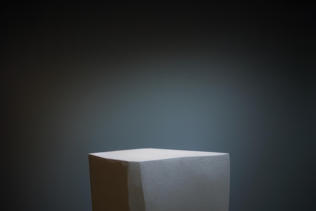 3d rendered white pedestal on dark background with spotlight podium for product stage