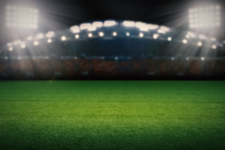 Photo 3d rendering empty soccer field with stadium at night