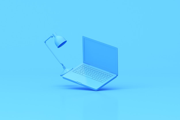 Foto rendering 3d di laptop e lampada.