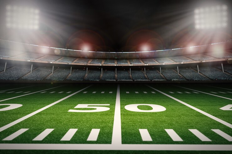 Foto 3d-rendering leeg amerikaans voetbalstadion 's nachts