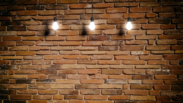 3d rendering light bulbs on brick wall background