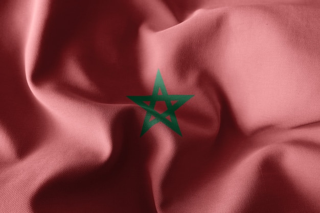 モロッコのリアルな手を振るシルクの旗を3Dレンダリング