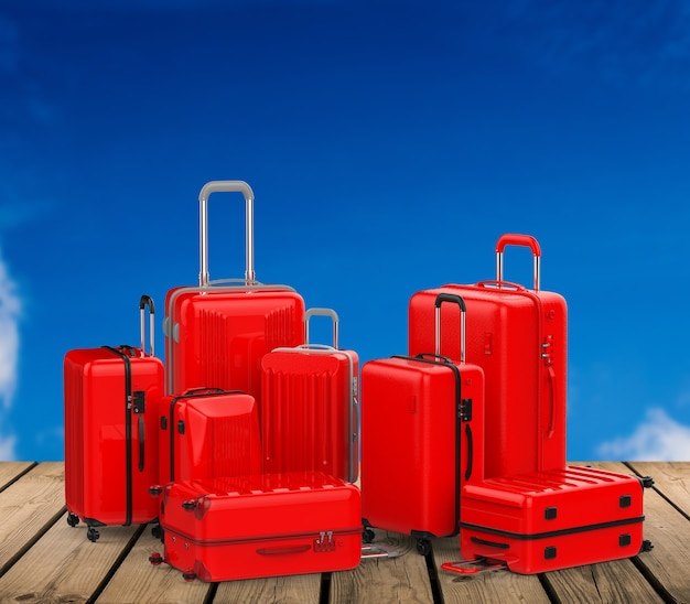 3D-rendering rode koffers met harde koffers met blauwe hemelachtergrond