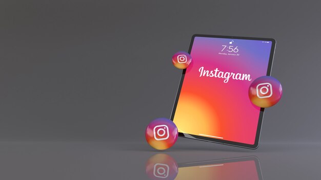 Instagramアプリのロゴを表示するiPadの前にあるいくつかのInstagramピルの3Dレンダリング。