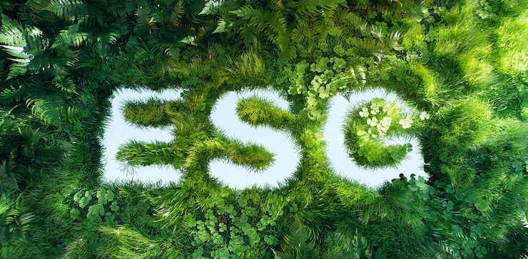 Photo 3dレンダリング: esg (エスグー) という単語は新鮮な草のフェルンとクローバーによって形成されています