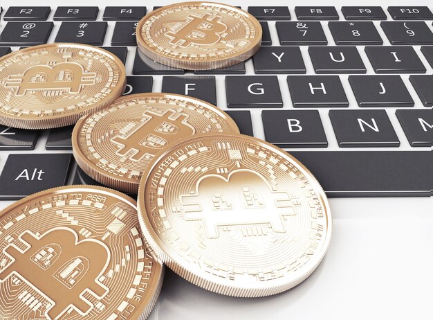 Foto 3d-stapel bitcoin gouden munten op een computertoetsenbord