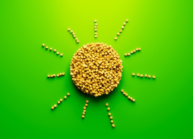 明るい緑の背景の 3 d イラストレーションに黄色のプラスチック ポリマーで作られた光線と 3 d のユニークな太陽
